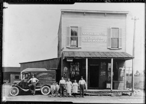 Sher family in front of M. Sher & Sons General Merchandise, Columbia Pike and Walter Reed Drive, circa 1922. Charlie Sher can be seen in front of the family's Model T Ford Utility Truck.