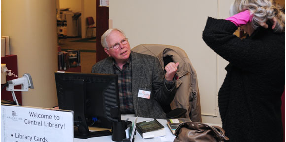 Gil Leigh volunteer welcome desk central